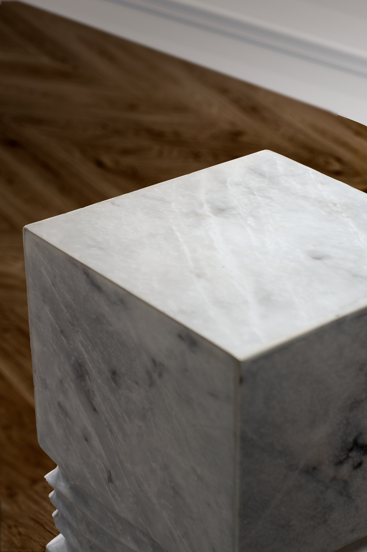 Elegant Elysian side table serving as a bedside table, enhancing bedroom decor.