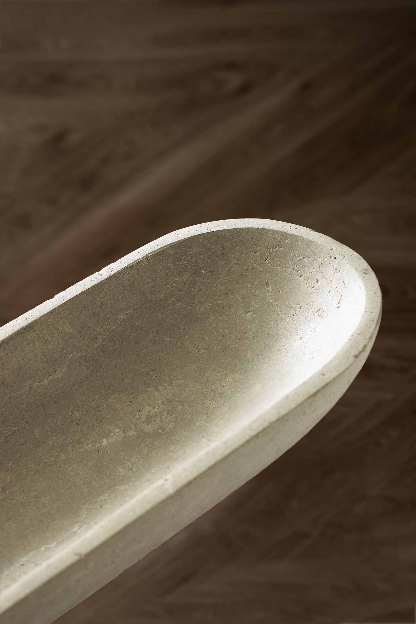 Serenity Oval Bowl in Travertine showcasing smooth polished surface and natural veining.