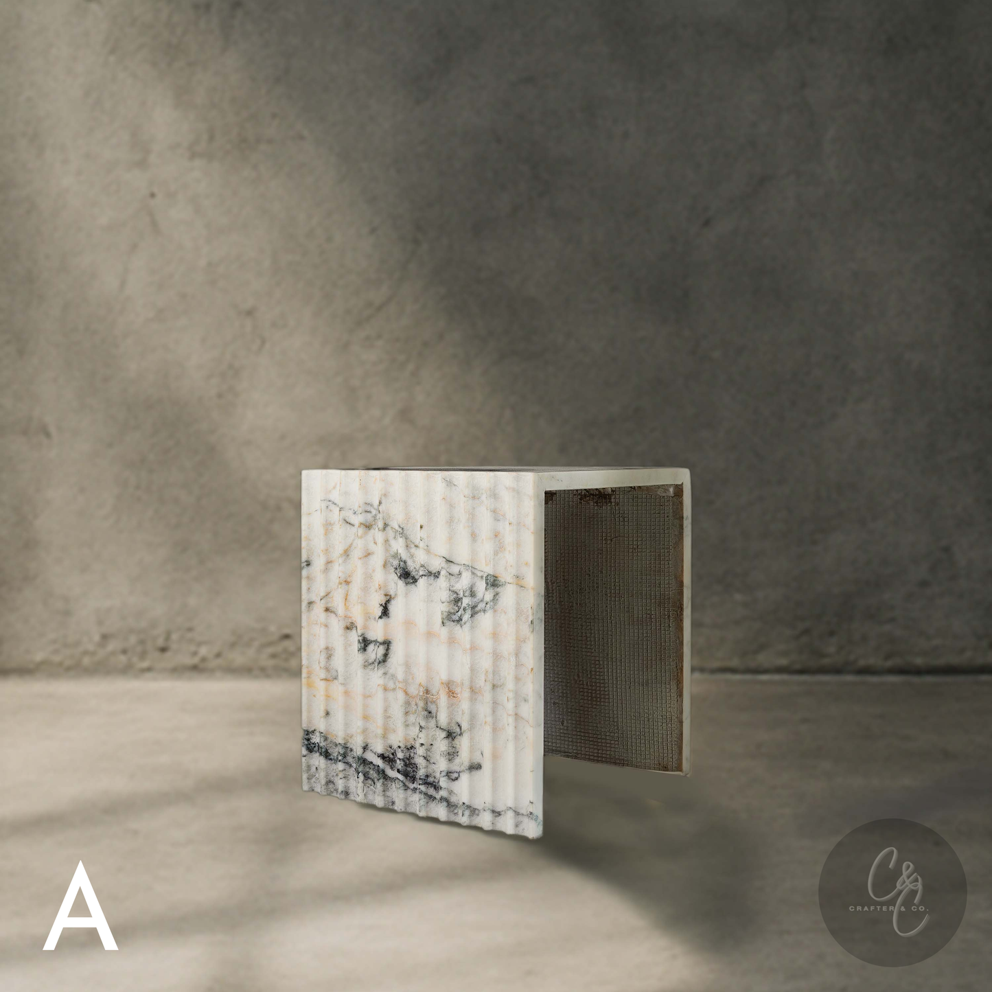 Calacatta Monet marble corrugated side table in aesthetic interior, luxury stone furniture
