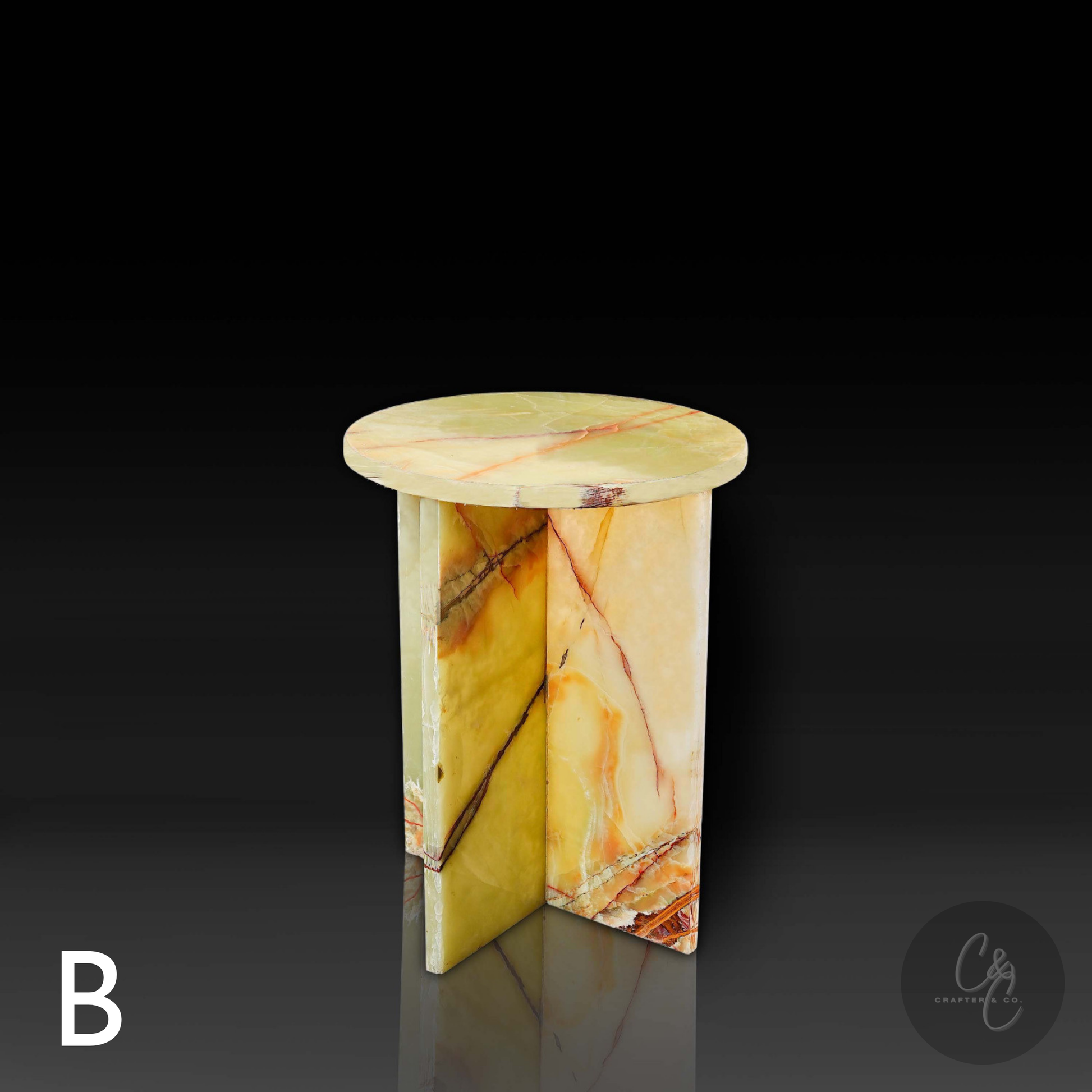 Green Onyx Cross Side Table with a dark background