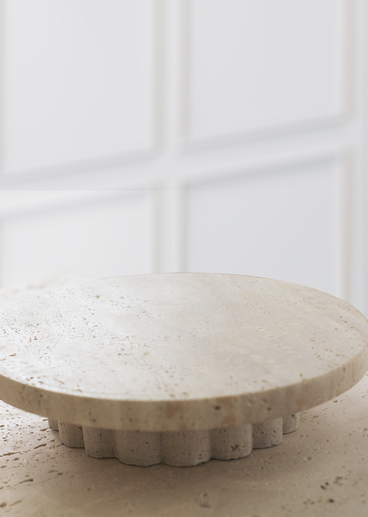 Front angle of the Column Travertine Round Tray showcasing its natural stone texture.