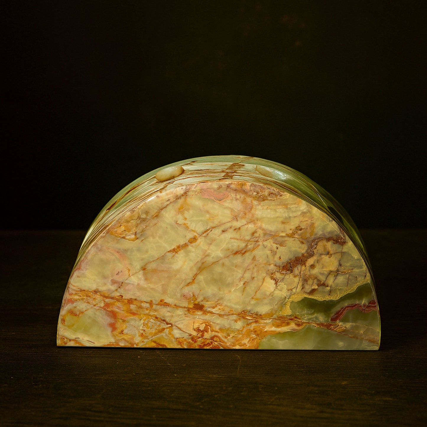 Maha Green Onyx Candle Holder styled on a coffee table in a luxury interior.