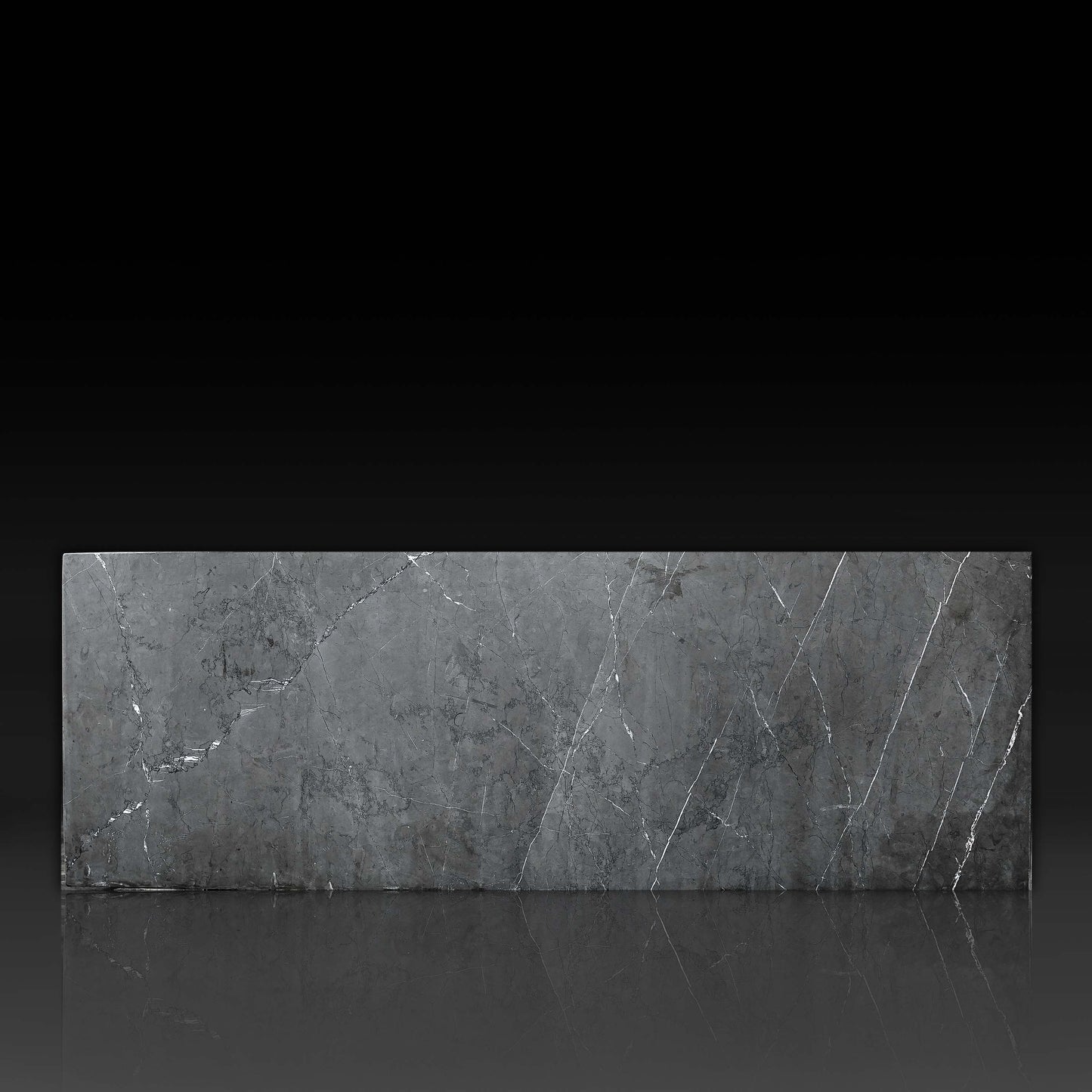 Front profile of Small Block Nero Marquina Grey Marble Coffee Table featuring natural grey marble with white veining and handcrafted stone finish