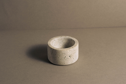 Small Travertine Decorative Bowl shown from a front angle highlighting the natural stone texture.