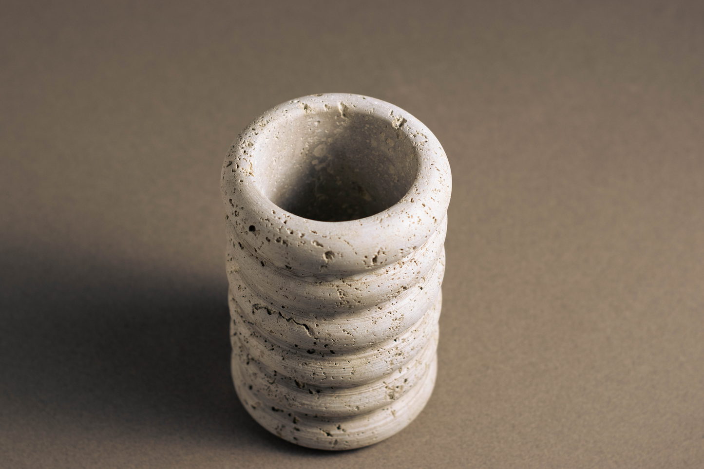Top view of Tidal Travertine Vase handcrafted from genuine natural travertine.