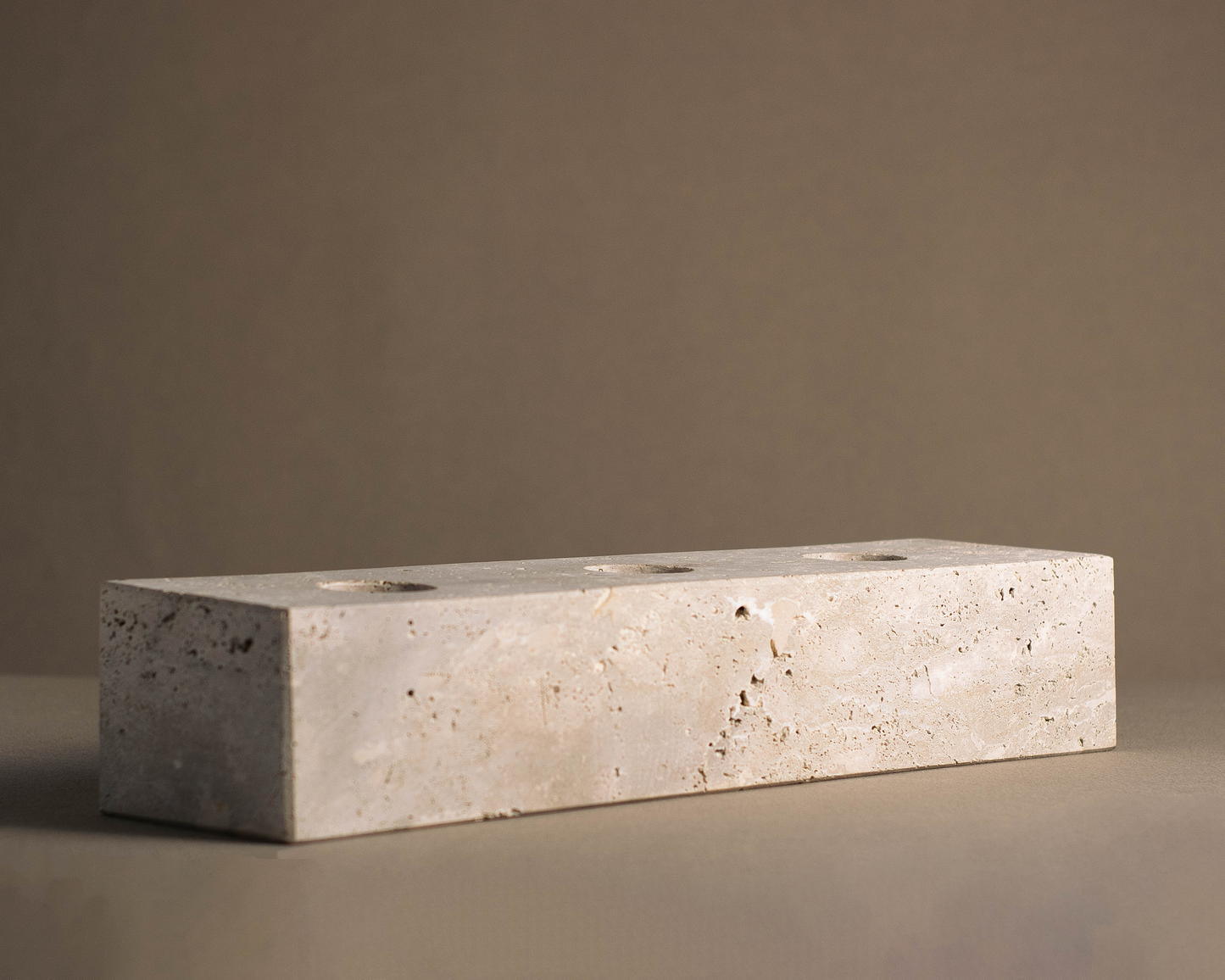 Travertine Tealight Candle Holder side angle handcrafted natural stone candle holder.