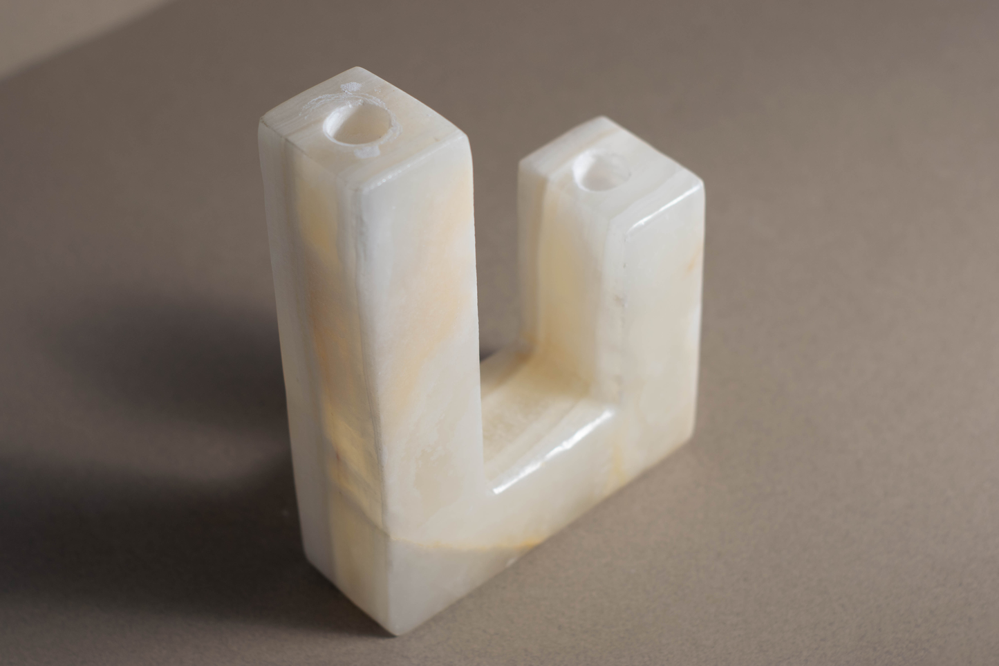 White Onyx L-Shaped Candle Holder side angle view handcrafted white onyx candle holder.