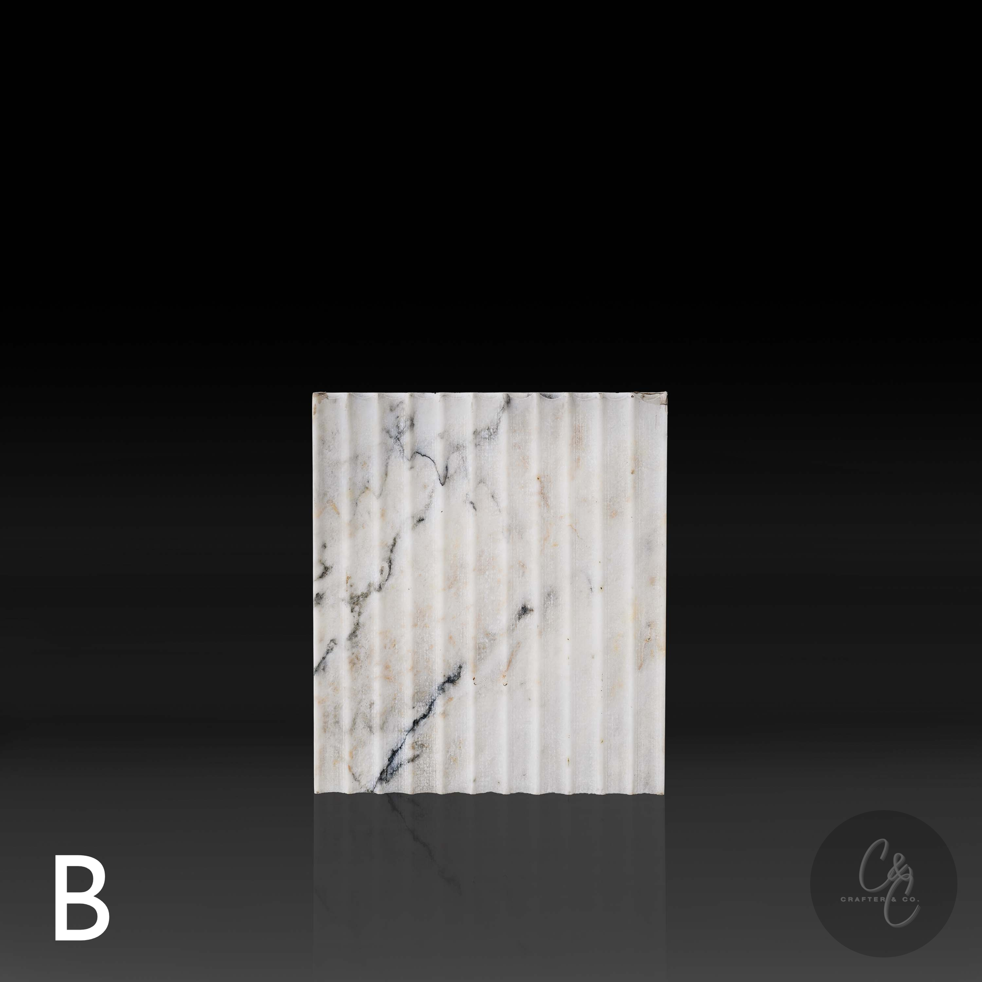 Calacatta Monet marble corrugated side table side view, handcrafted Italian stone furniture with gold and grey veining