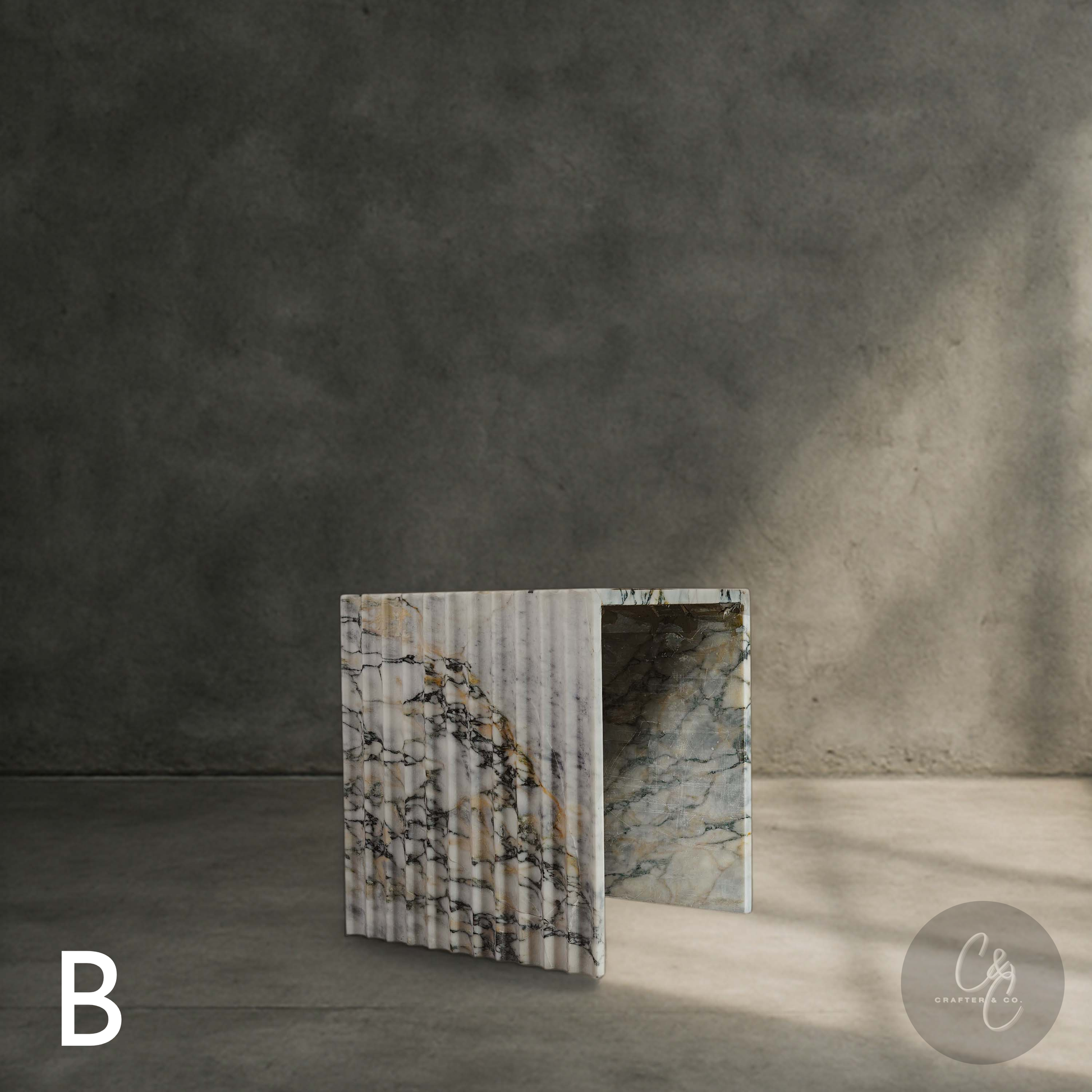 Arbescato Viola corrugated side table styled in modern interior with concrete wall. Aesthetic feel 