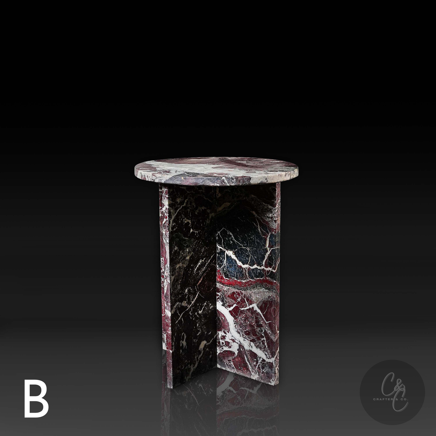 Round Cross Rosso Levanto marble side table front view highlighting bold burgundy and white veining with honed finish