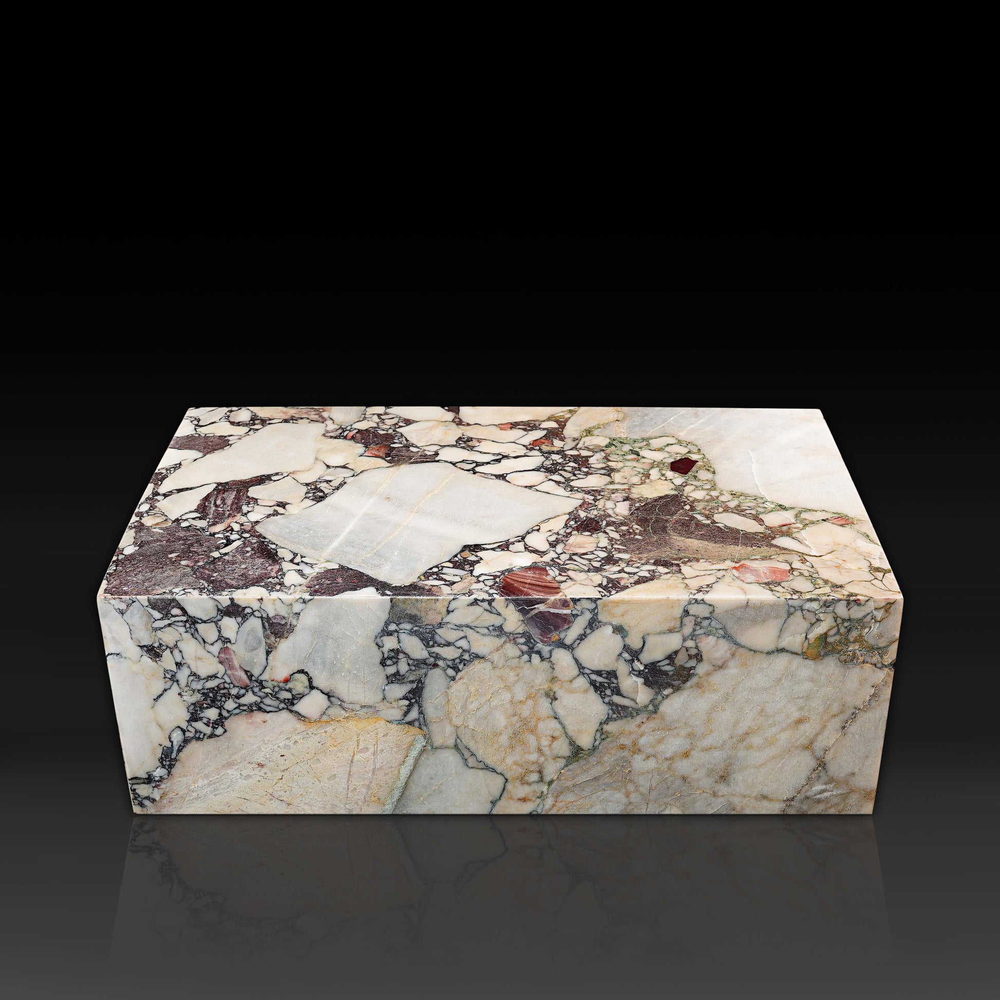 Front view of the Small Block Coffee Table in Breccia Capraia Marble