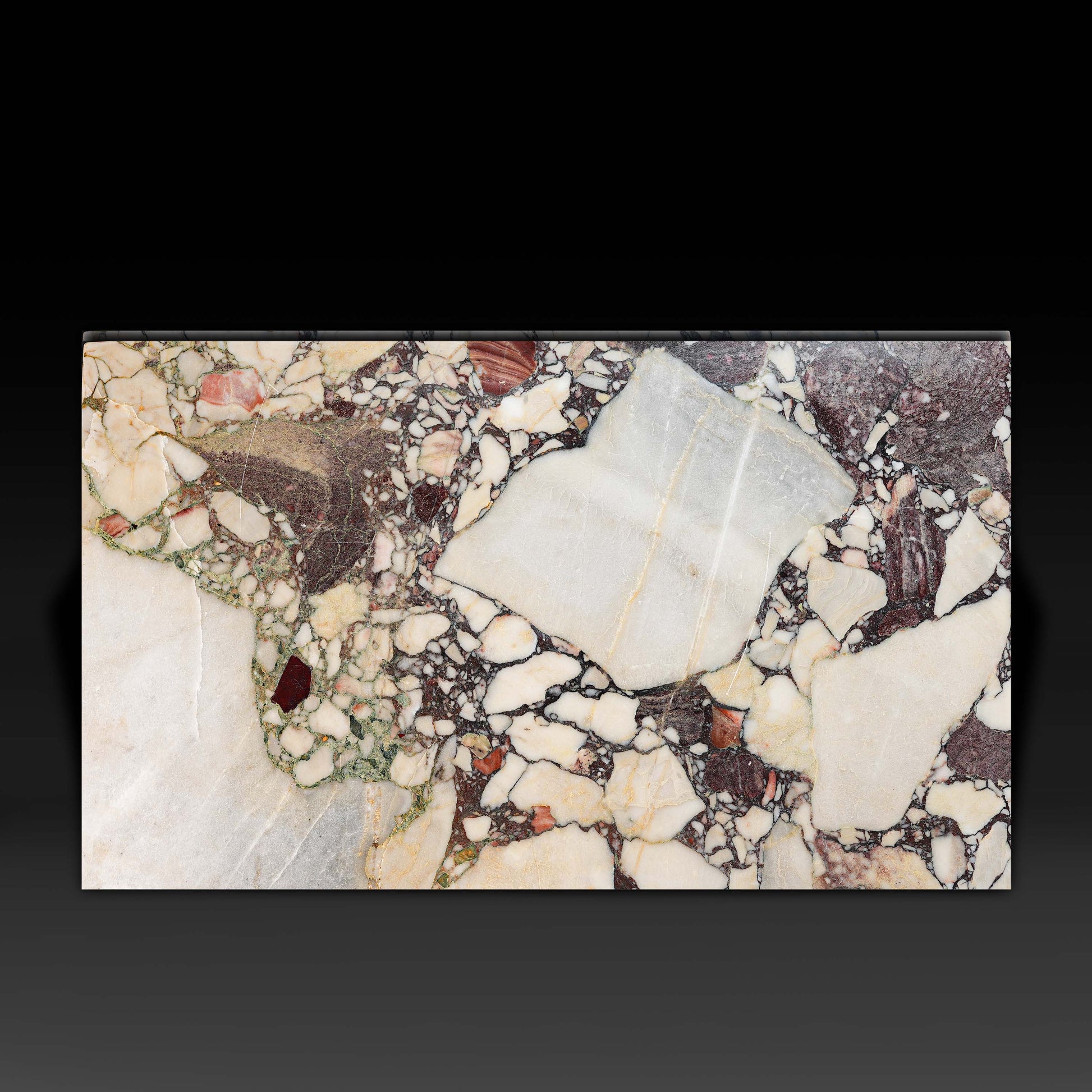 Top view of the Small Block Coffee Table in Breccia Capraia Marble showcasing its natural veining.