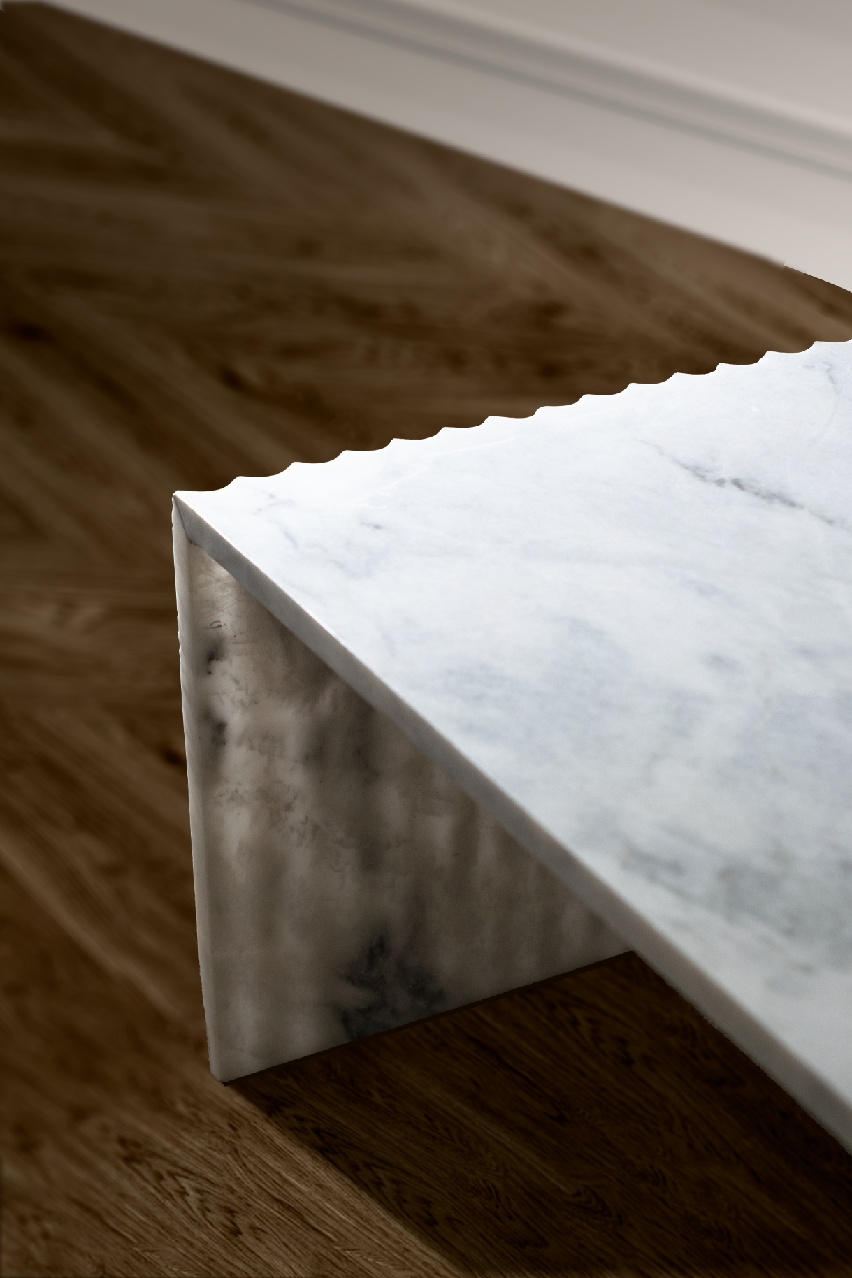 Close-up of the Stria Corrugated White Marble Coffee Table showing the polished white marble top and sculptural corrugated edge.