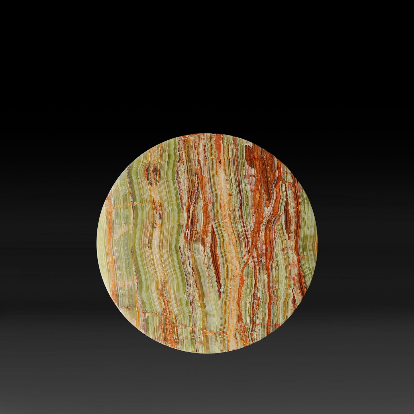 Top view of the Vela Green Onyx Side Table showcasing natural green onyx with distinctive green, gold and rust veining.