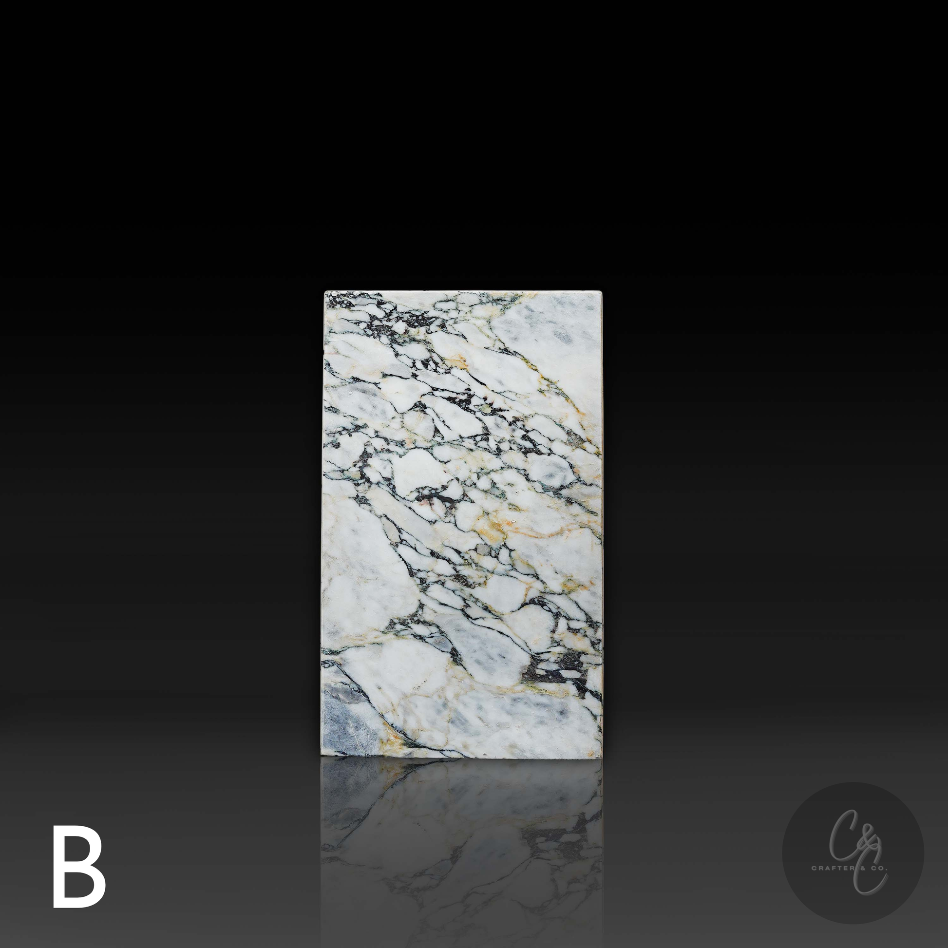 Front elevation of Arabescato Viola marble column side table Variant B highlighting dramatic natural stone veining.