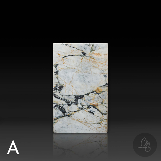 Front elevation of Arabescato Viola marble column side table showcasing distinctive natural marble veining.