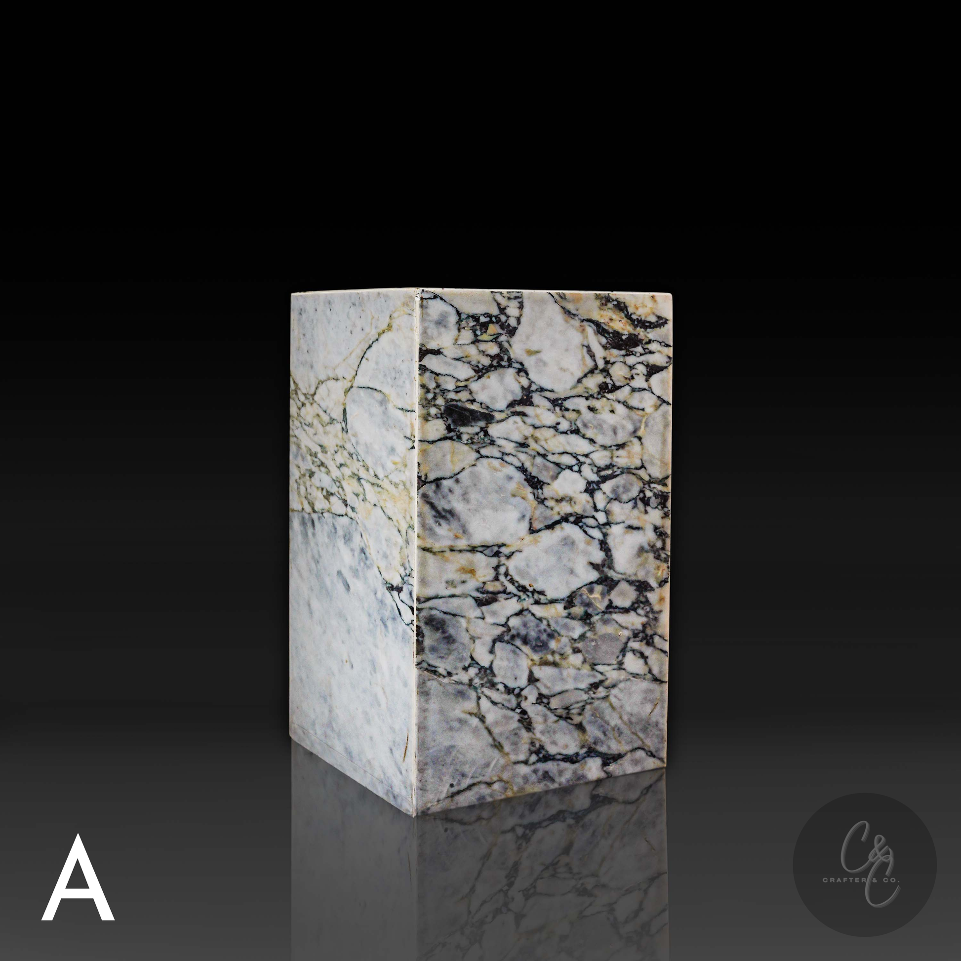 Arabescato Viola marble column side table front profile highlighting sculptural design and natural stone patterns.
