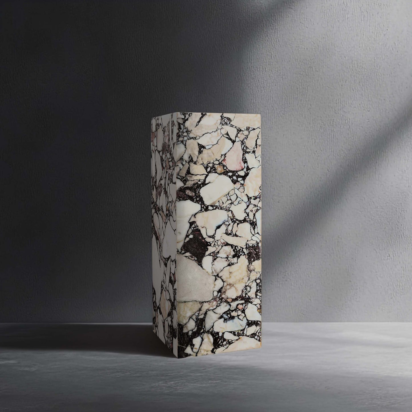 Breccia Capraia marble plinth handcrafted from natural stone.