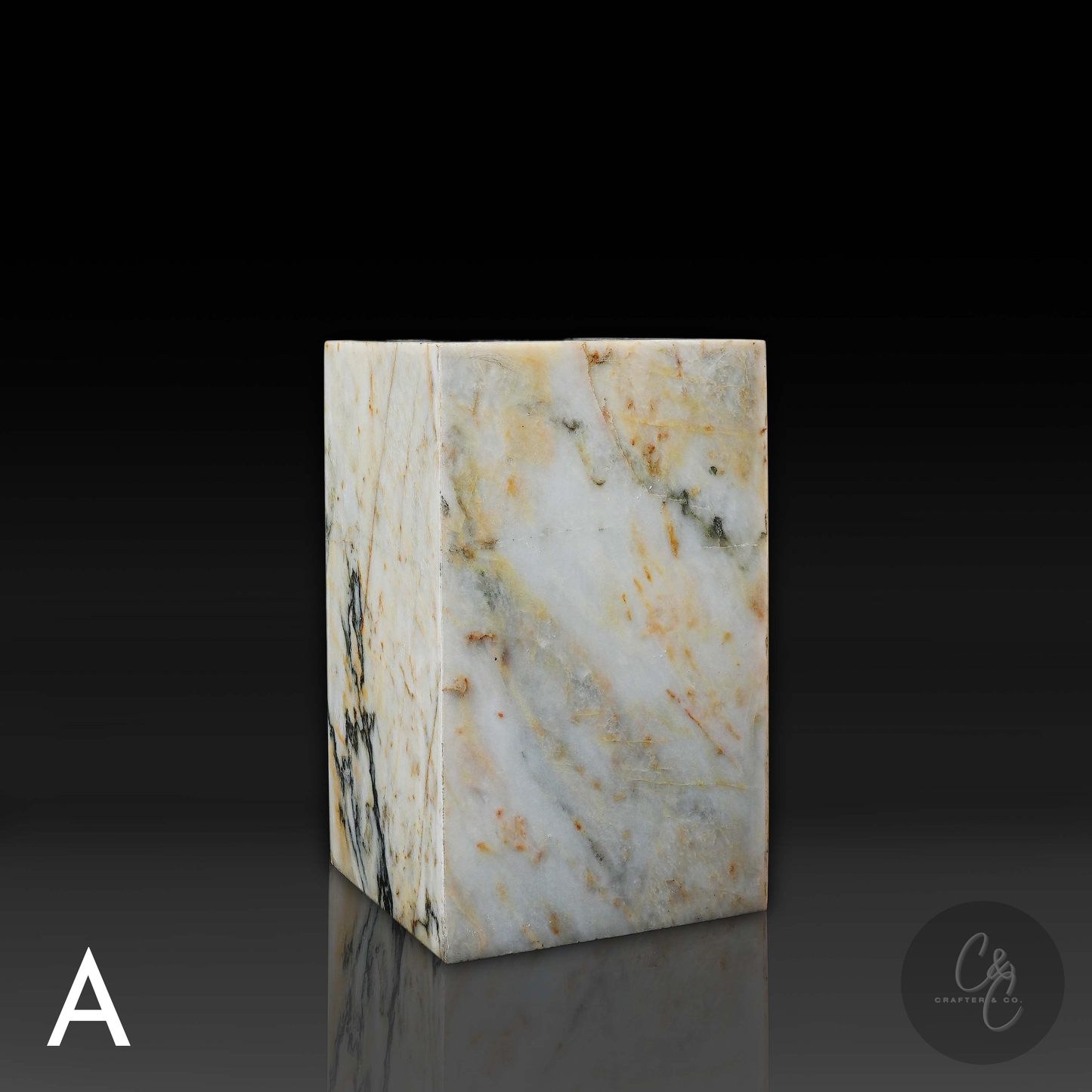 Front profile of Calacatta Monet marble side table highlighting premium white marble with dramatic natural patterns.