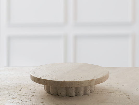 Column Travertine Round Tray handcrafted from natural travertine with a sculptural column base