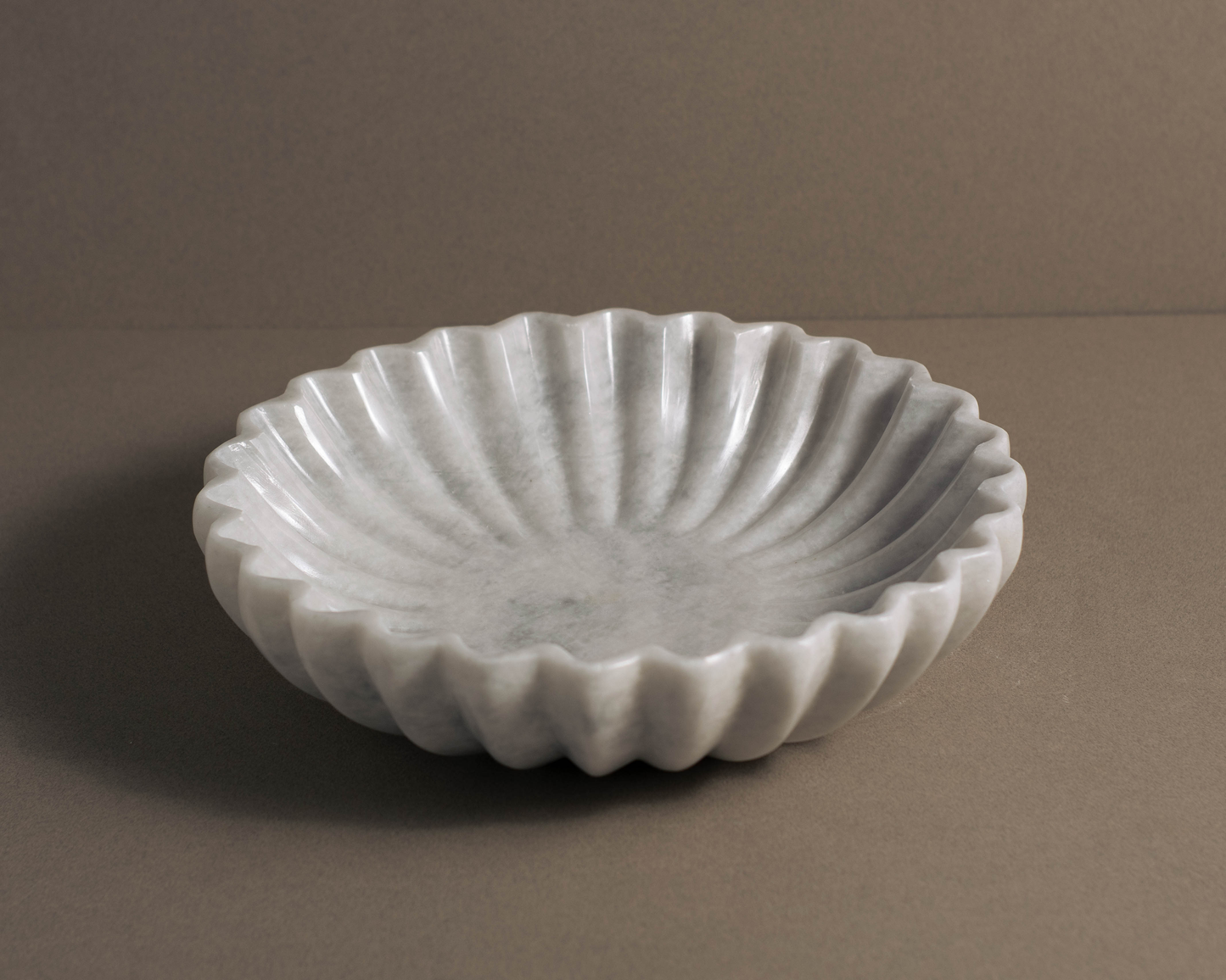 Coral White Marble Bowl showcasing its elegant fluted profile and handcrafted marble finish.