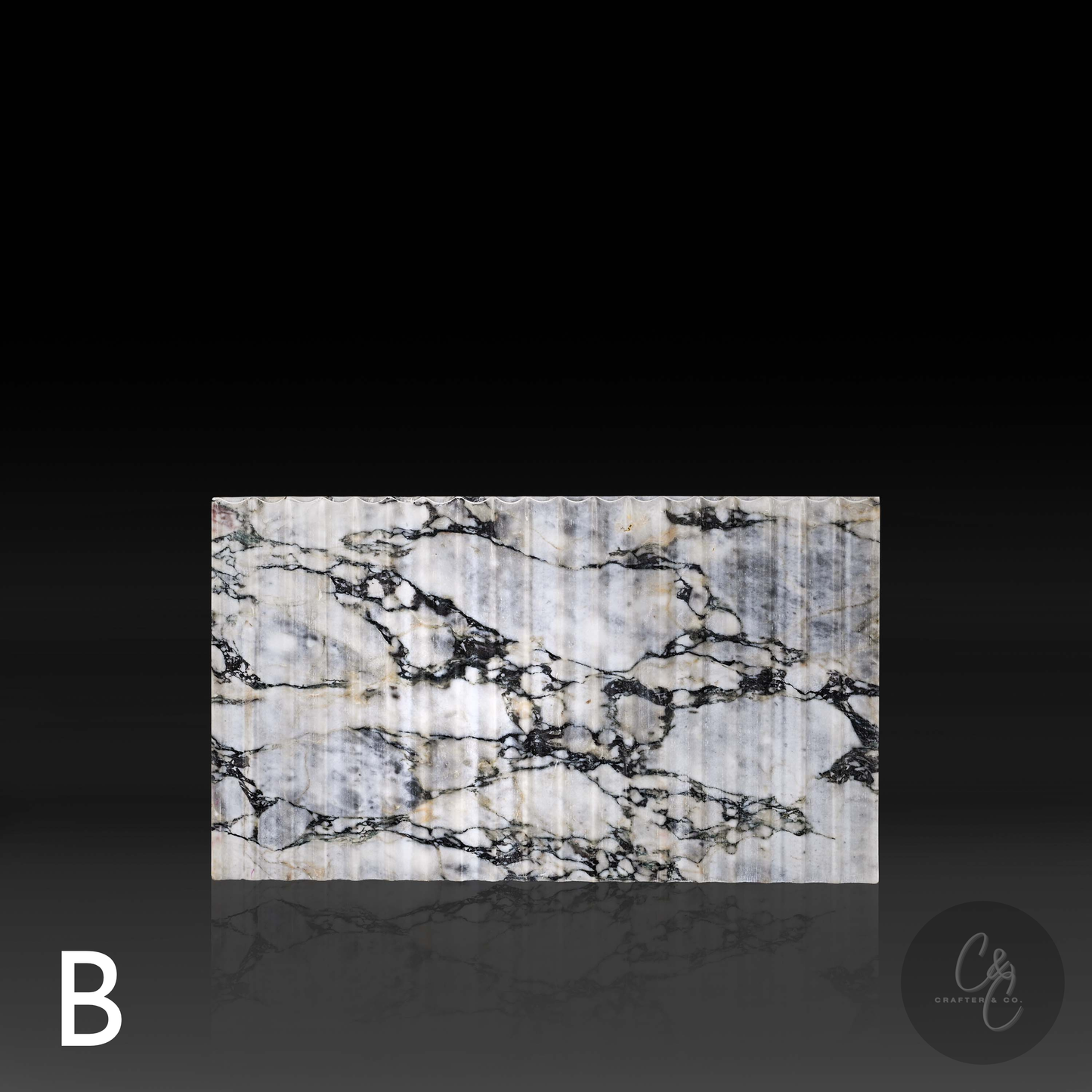 Fluted side detail of Arabescato Viola Corrugated Coffee Table showing natural marble veining – Variant B