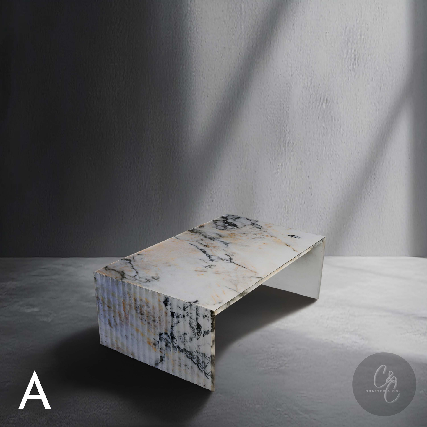 Corrugated Marble Coffee Table in Calacatta Monet with sculptural fluted design.
