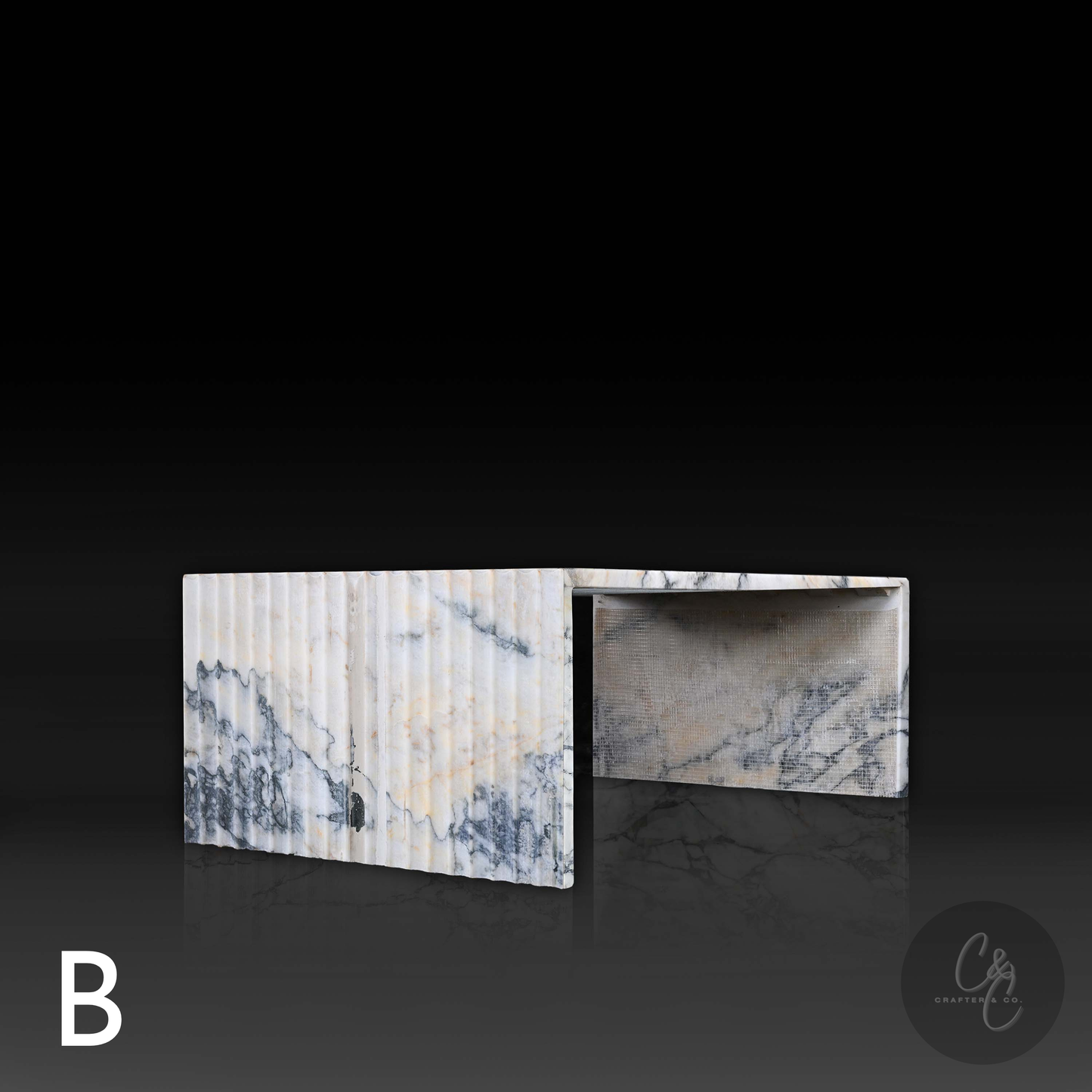 Side view of Variant B Corrugated Marble Coffee Table in Calacatta Monet highlighting the fluted marble design.