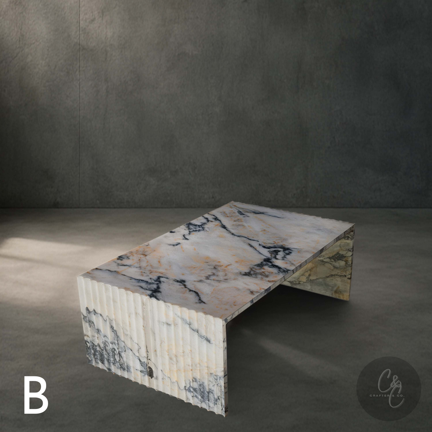 Variant B Corrugated Marble Coffee Table in Calacatta Monet with sculptural fluted marble design.