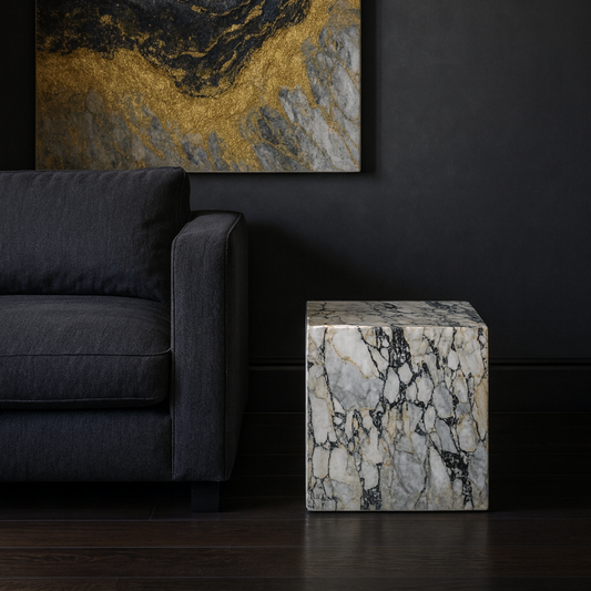 Arabescato Viola Cube Side Table styled beside a modern sofa in a luxury living room