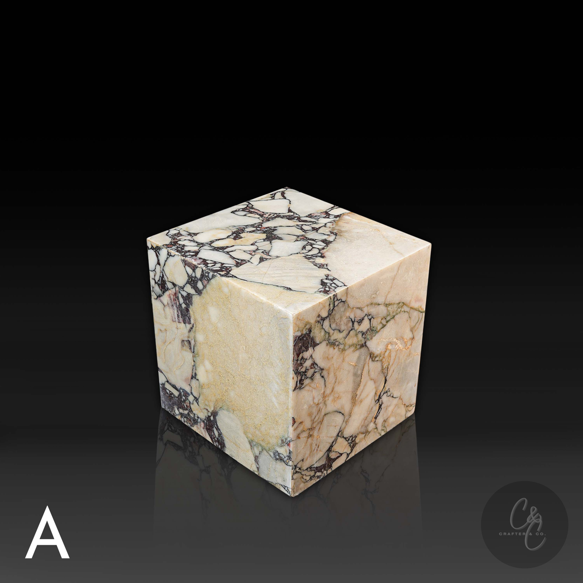 Cube Side Table in Breccia Capraia marble front angle showcasing distinctive natural veining and rich colour variation