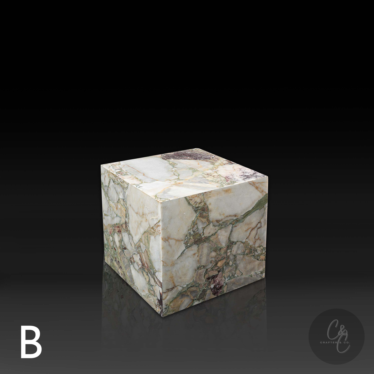 Cube Side Table in Breccia Capraia marble front profile showcasing dramatic natural veining.