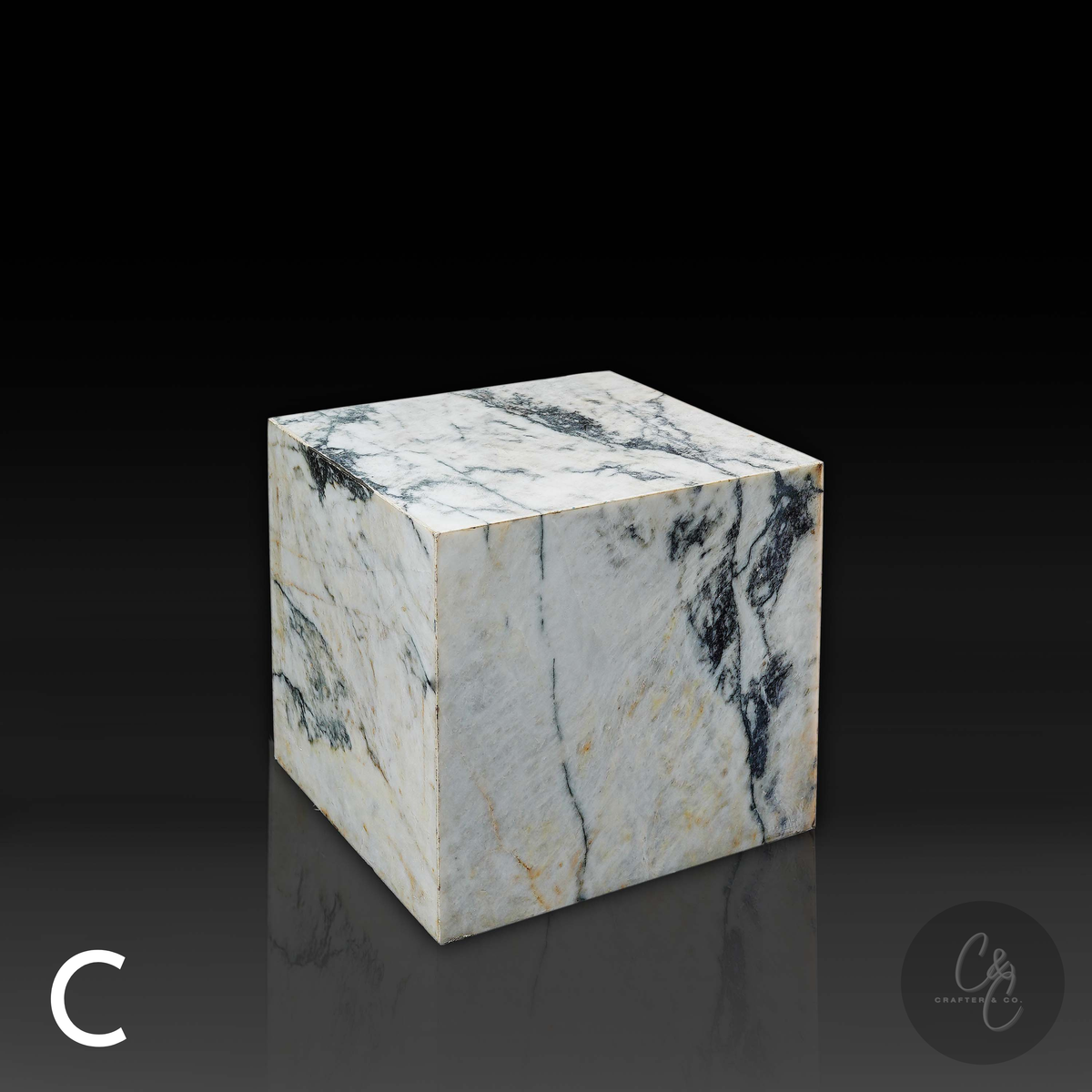 Cube Side Table in Calacatta Monet marble front profile showcasing distinctive natural veining.
