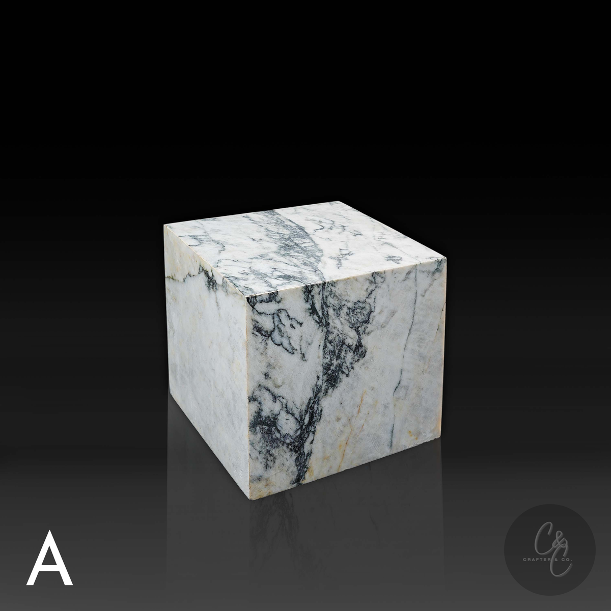 Cube Side Table in Calacatta Monet marble front profile with dramatic natural veining