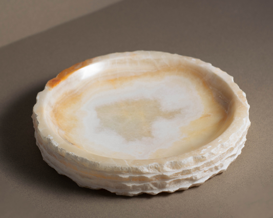 Top view of the Eclipse White Onyx Bowl highlighting natural white onyx patterns and polished finish.