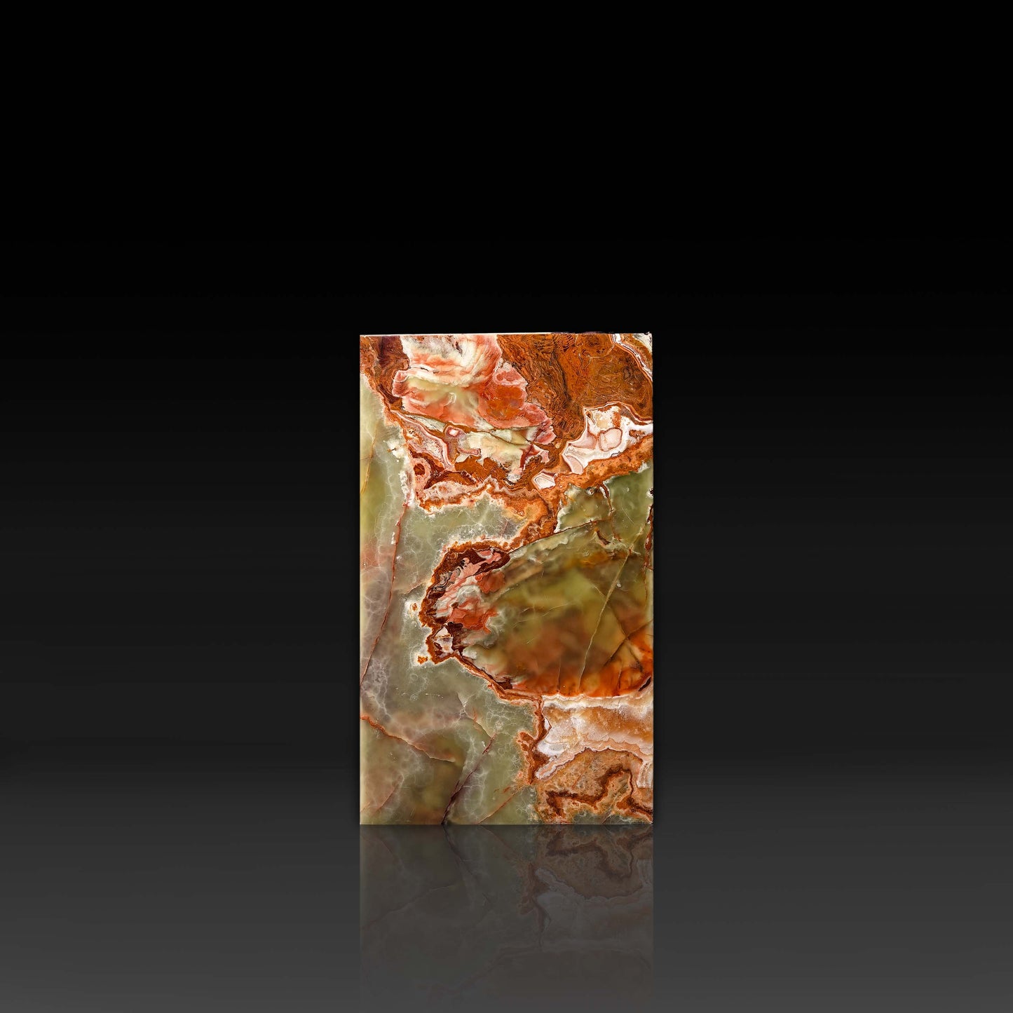 Front view of handcrafted Green Onyx column side table with polished natural stone finish.