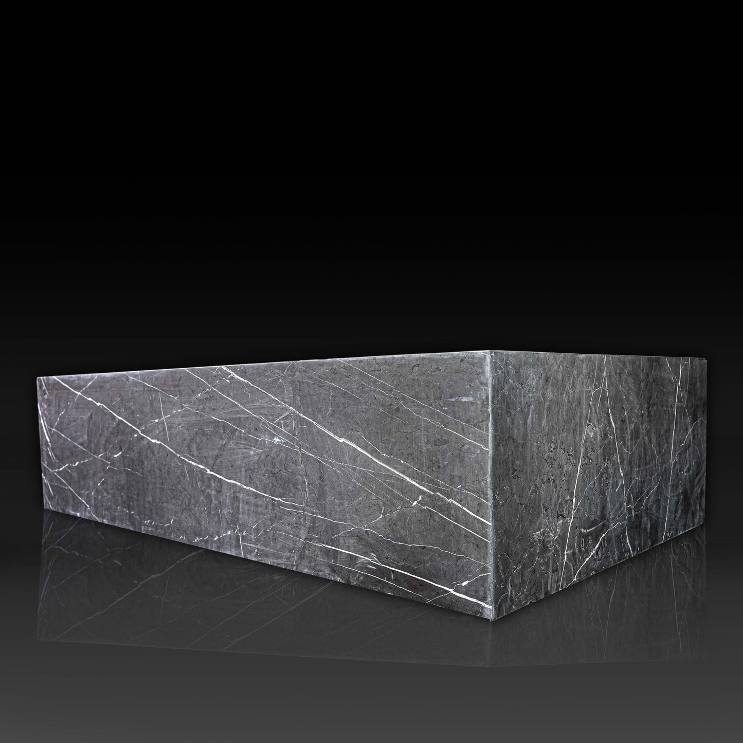 Angled view of the Large Block Coffee Table in Nero Marquina Grey Marble with honed finish and natural white veining