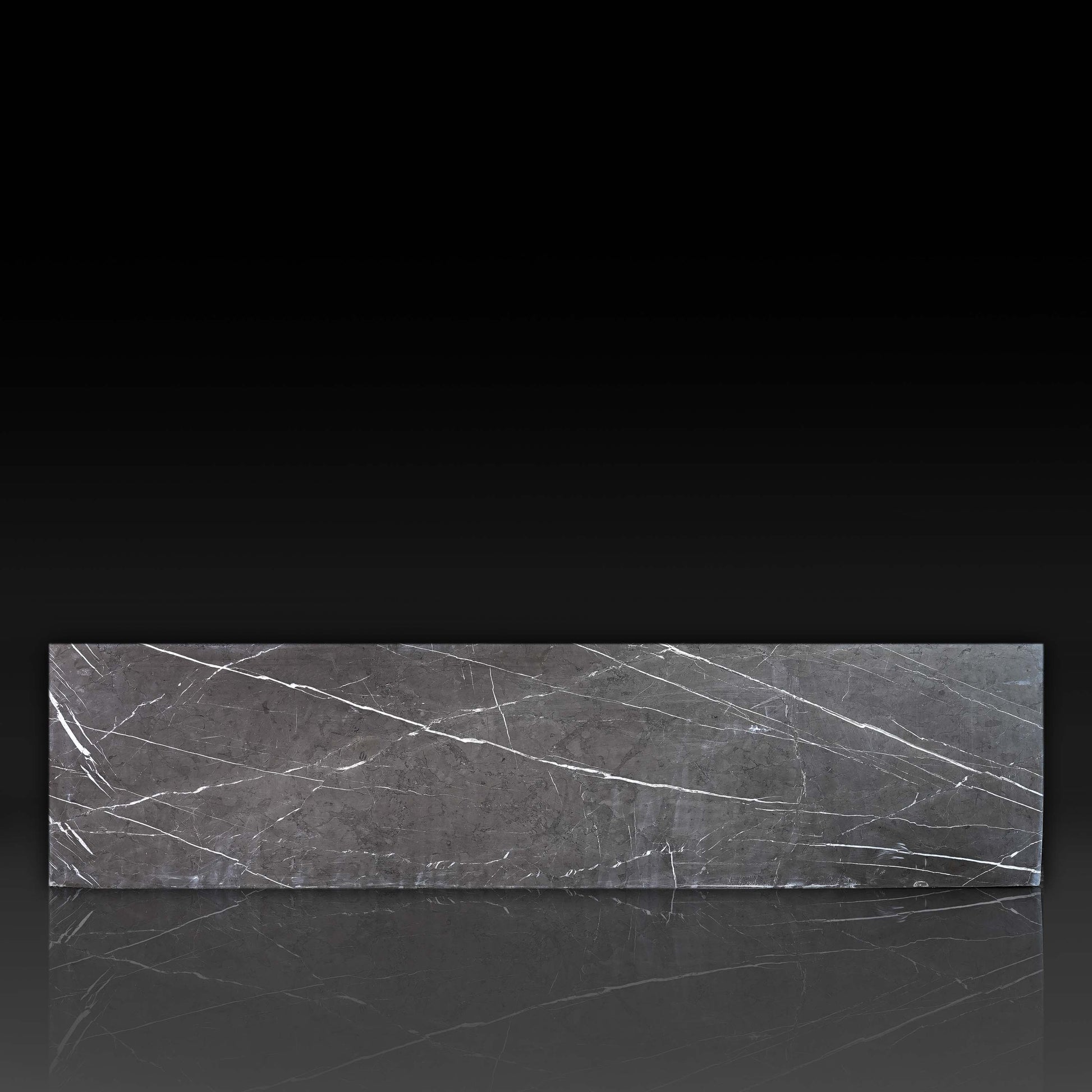Front profile of the Large Block Coffee Table in Nero Marquina Grey Marble with honed finish and natural white veining