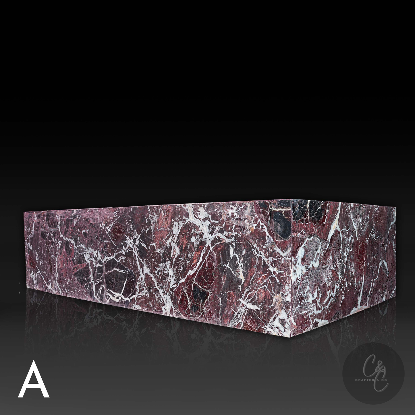 Angled side view of Large Block Coffee Table in Rosso Levanto Marble (Variant A) showcasing rich burgundy marble, dramatic white veining and a honed finish.