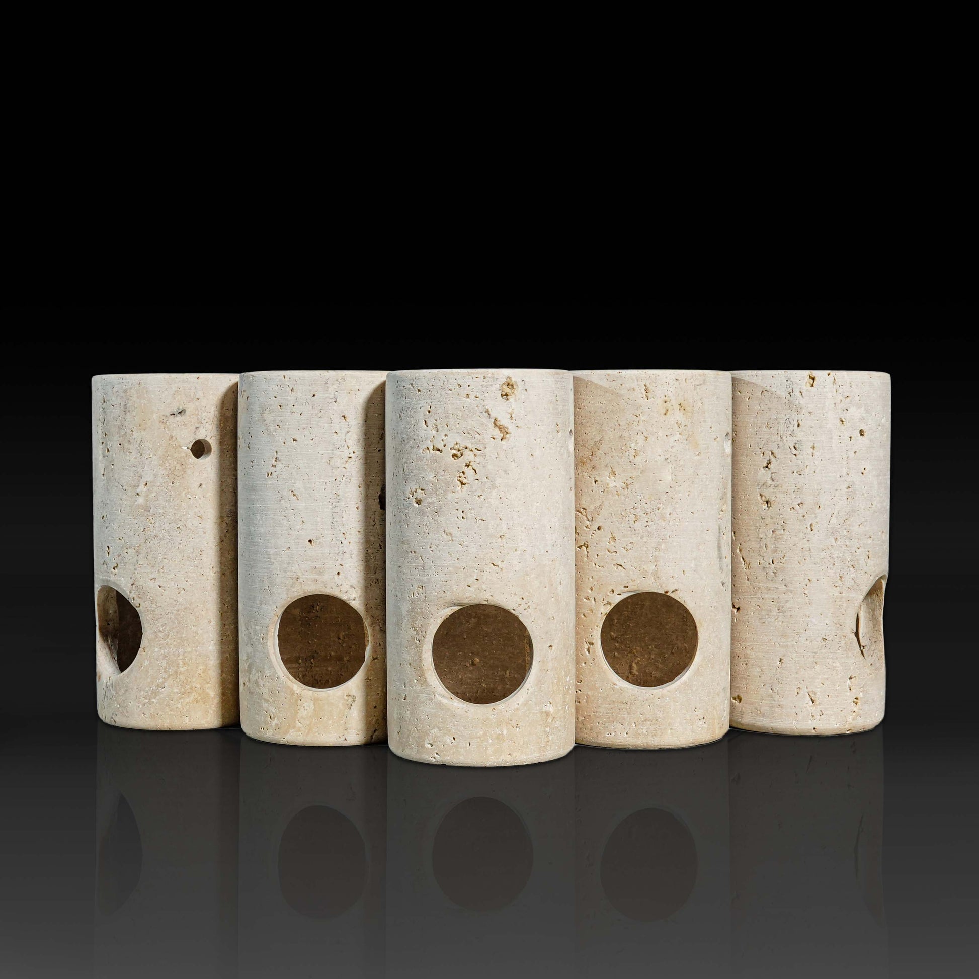 Collection of handcrafted natural stone oil burners travertine.