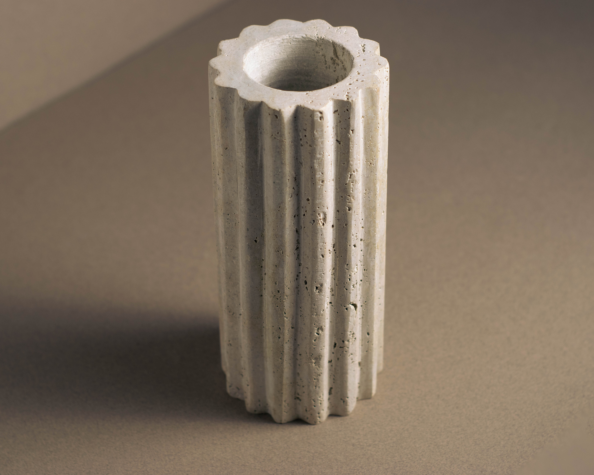 Lumiere Travertine Fluted Vase top angle natural travertine vase.