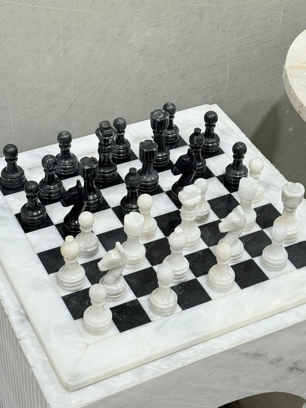 Maha Black and White Marble Chess Set with handcrafted stone chess pieces.
