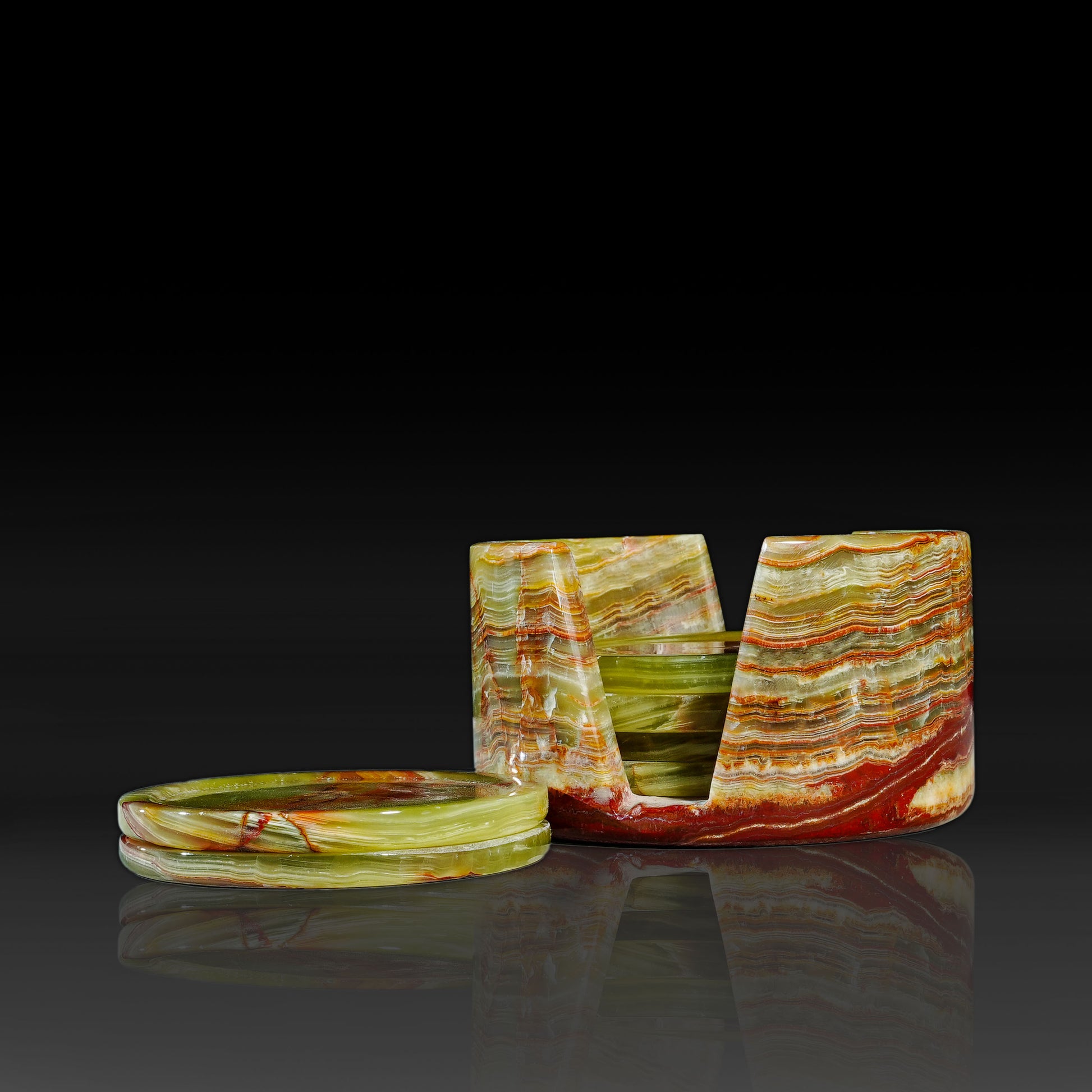 Murmor natural stone coasters set with holder in Green Onyx displaying stacked round coasters.
