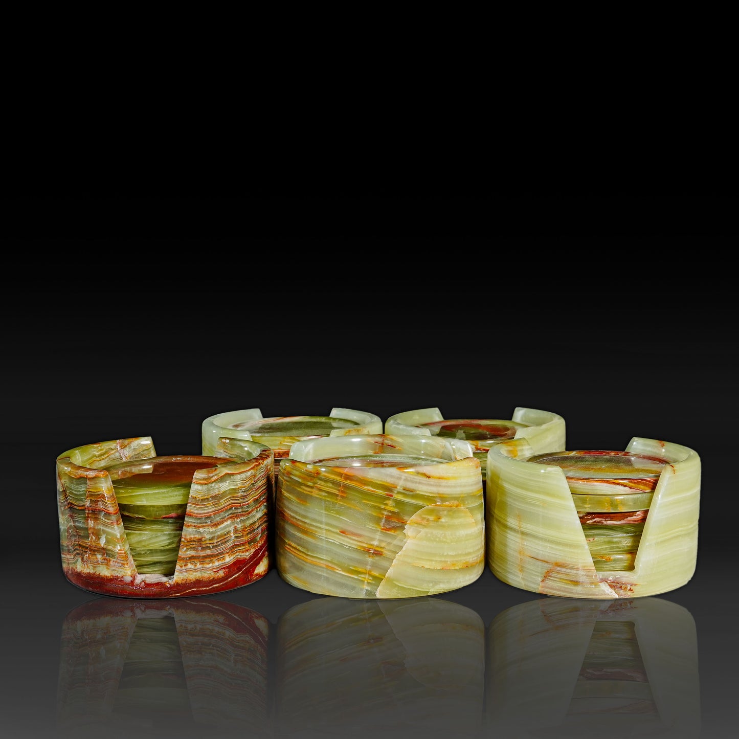 Group of Murmor green onyx natural stone coasters sets with matching holders.
