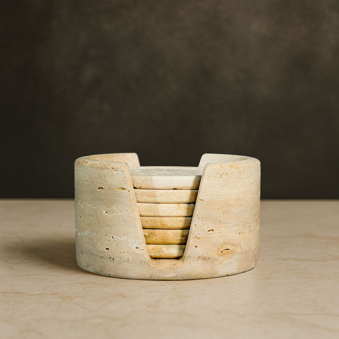 Murmor natural stone coasters set with holder in Travertine showcasing warm natural stone texture.
