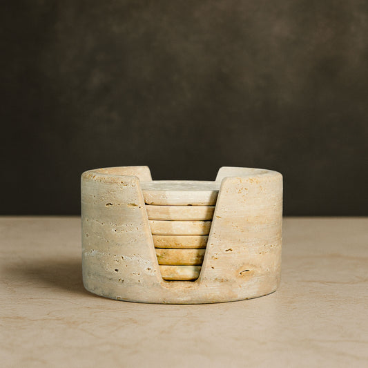 Murmor natural stone coasters set with holder in Travertine showcasing warm natural stone texture.