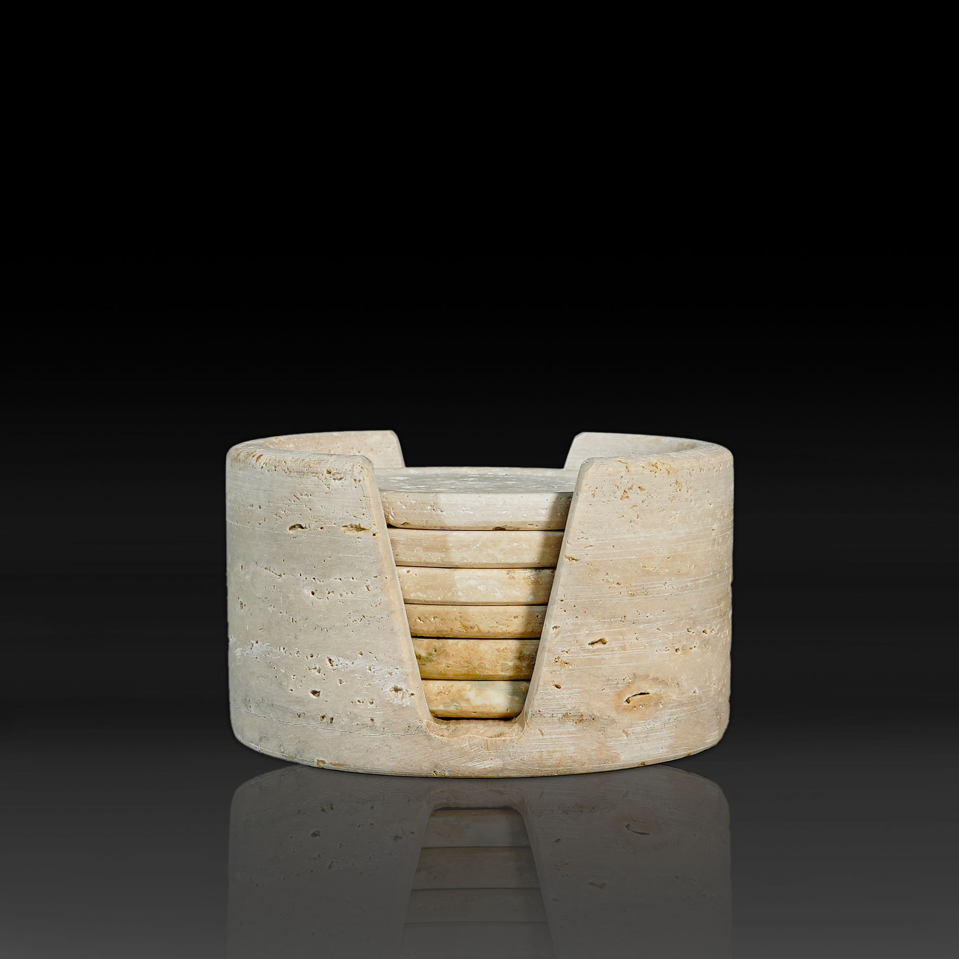 Front view of Murmor travertine natural stone coaster holder with matching coasters