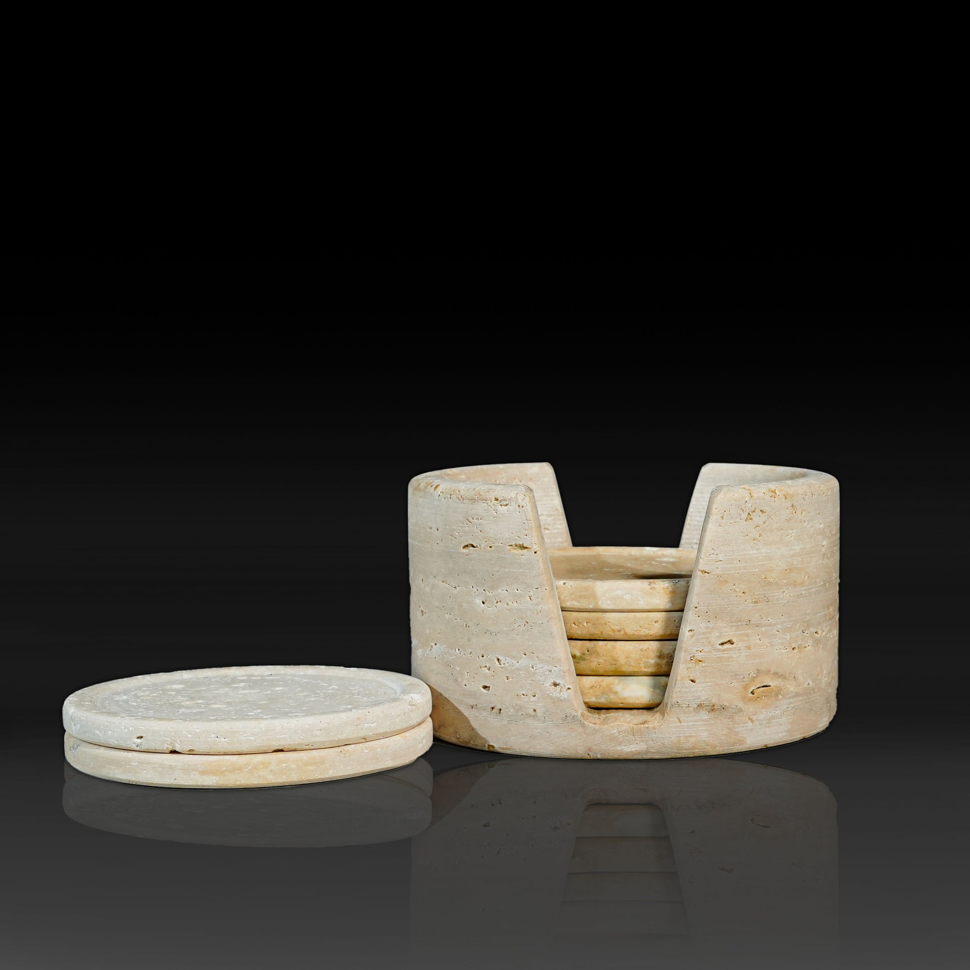 Murmor natural stone coasters set with holder in Travertine displaying stacked round coasters.