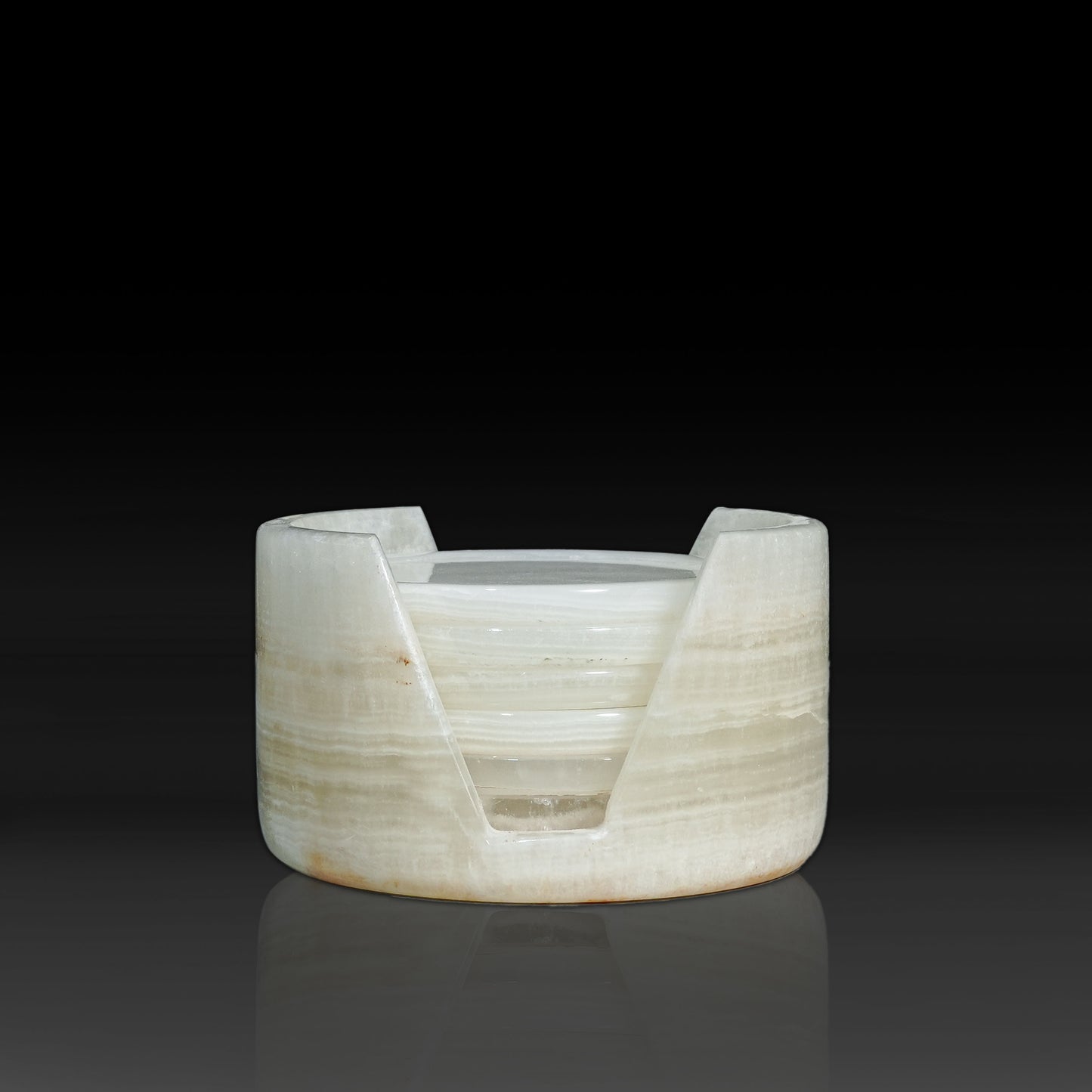 Front view of Murmor White Onyx natural stone coaster holder with matching coasters.