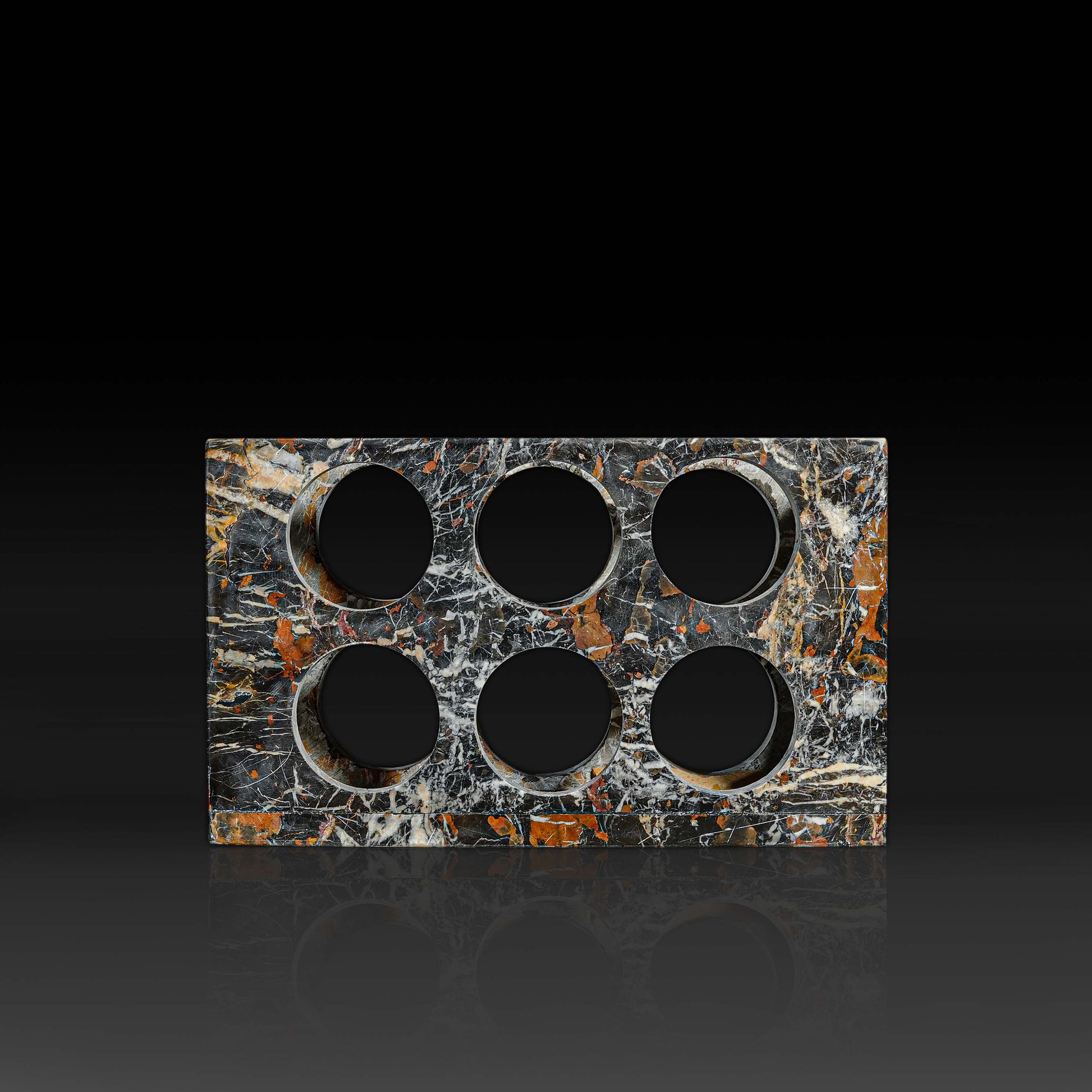 Front view of Quadrant Black and Gold Marble wine rack designed to hold six wine bottles.